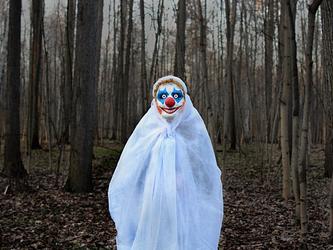 Scary clown in woods_Crop